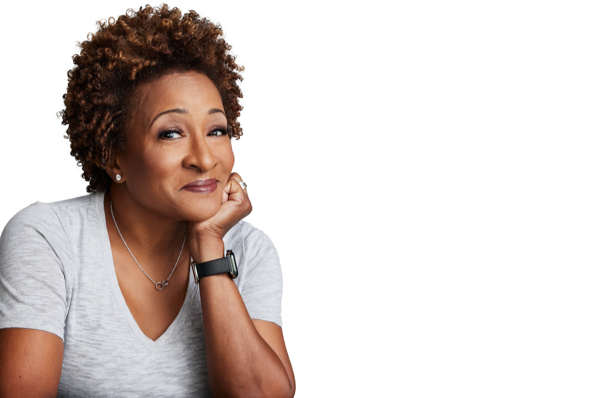 Photo of Wanda in a grey t-shirt with her head resting on her hand